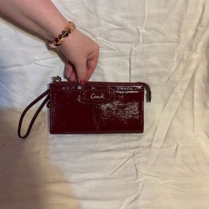 Coach burgundy leather wristlet